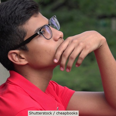 Thoughtful Hispanic young man | Shutterstock, cheapbooks