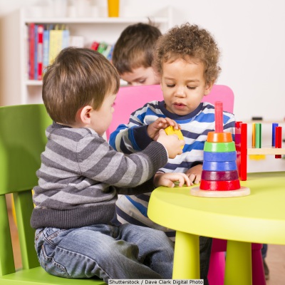 Toddlers playing with blocks | Shutterstock, Dave Clark Digital Photo
