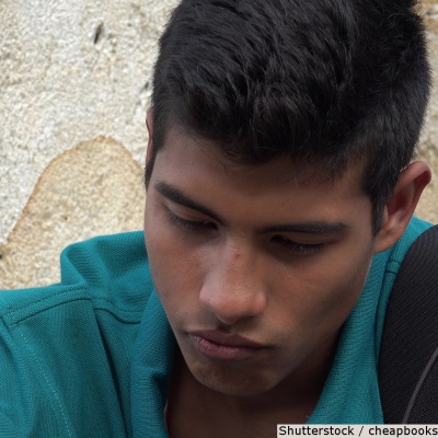 Worried Hispanic youth | Shutterstock, cheapbooks