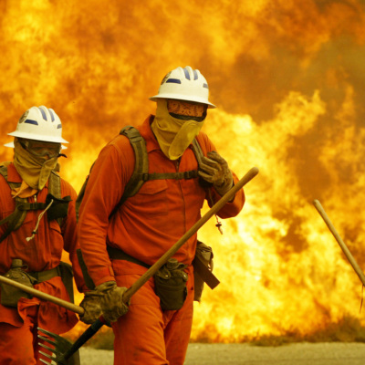 image of incarcerated people enlisted to fight wildfires in Santa Clarita, California.